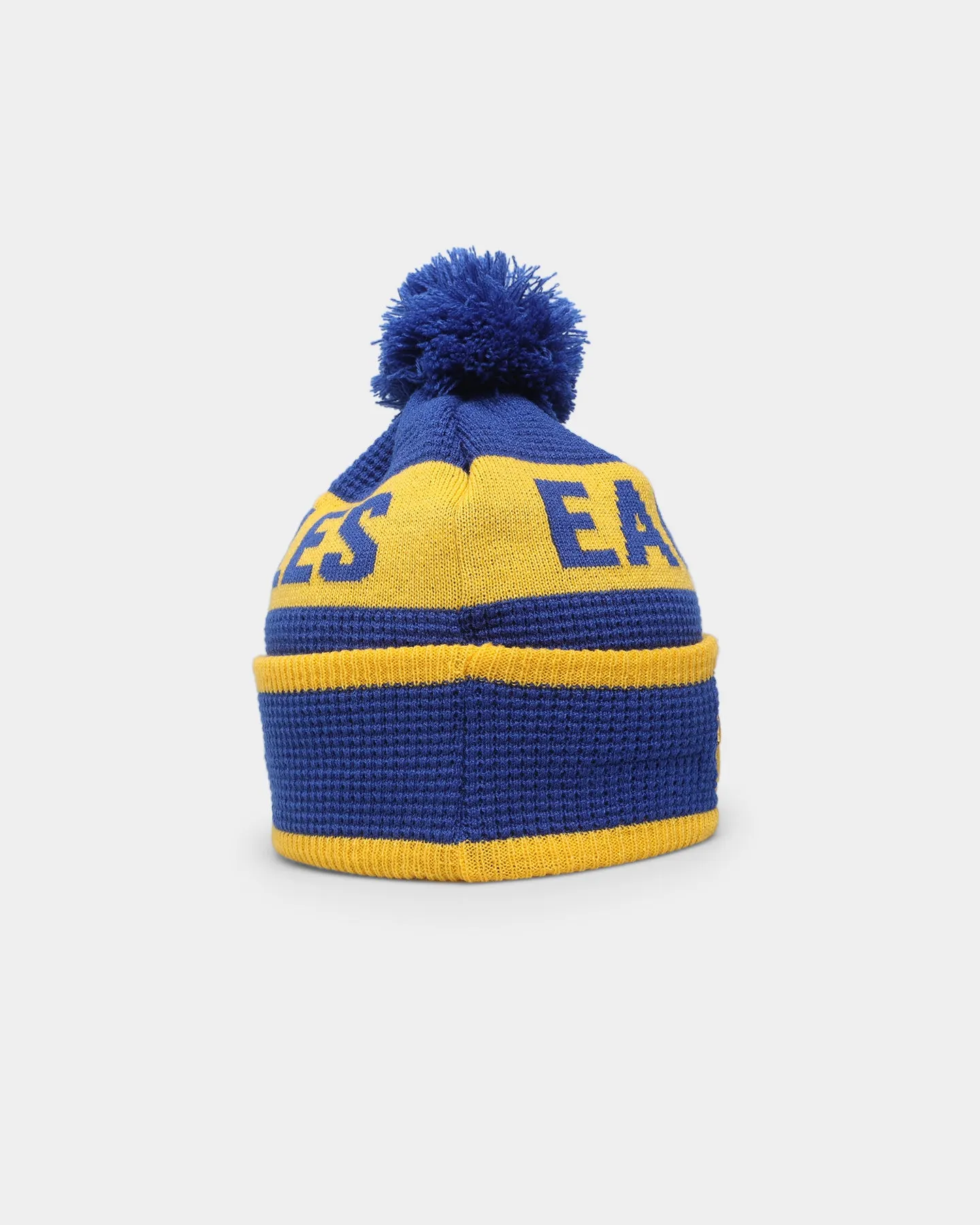 New Era West Coast Eagles AFL Opening Bounce 2022 Pom Waffle Wordmark Beanie Medium Blue/Yellow