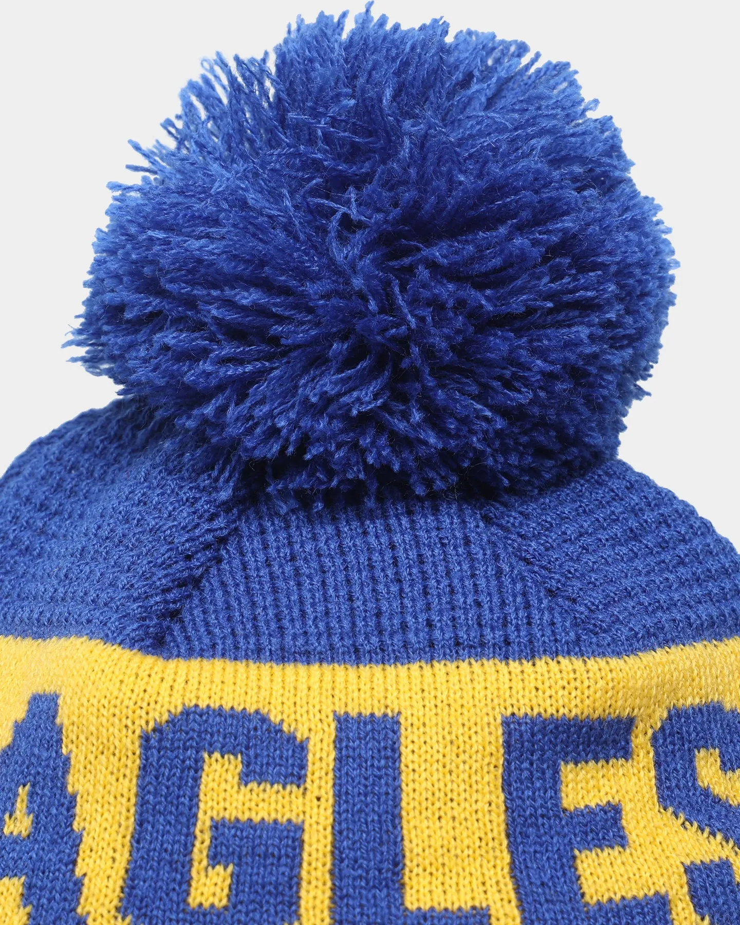 New Era West Coast Eagles AFL Opening Bounce 2022 Pom Waffle Wordmark Beanie Medium Blue/Yellow