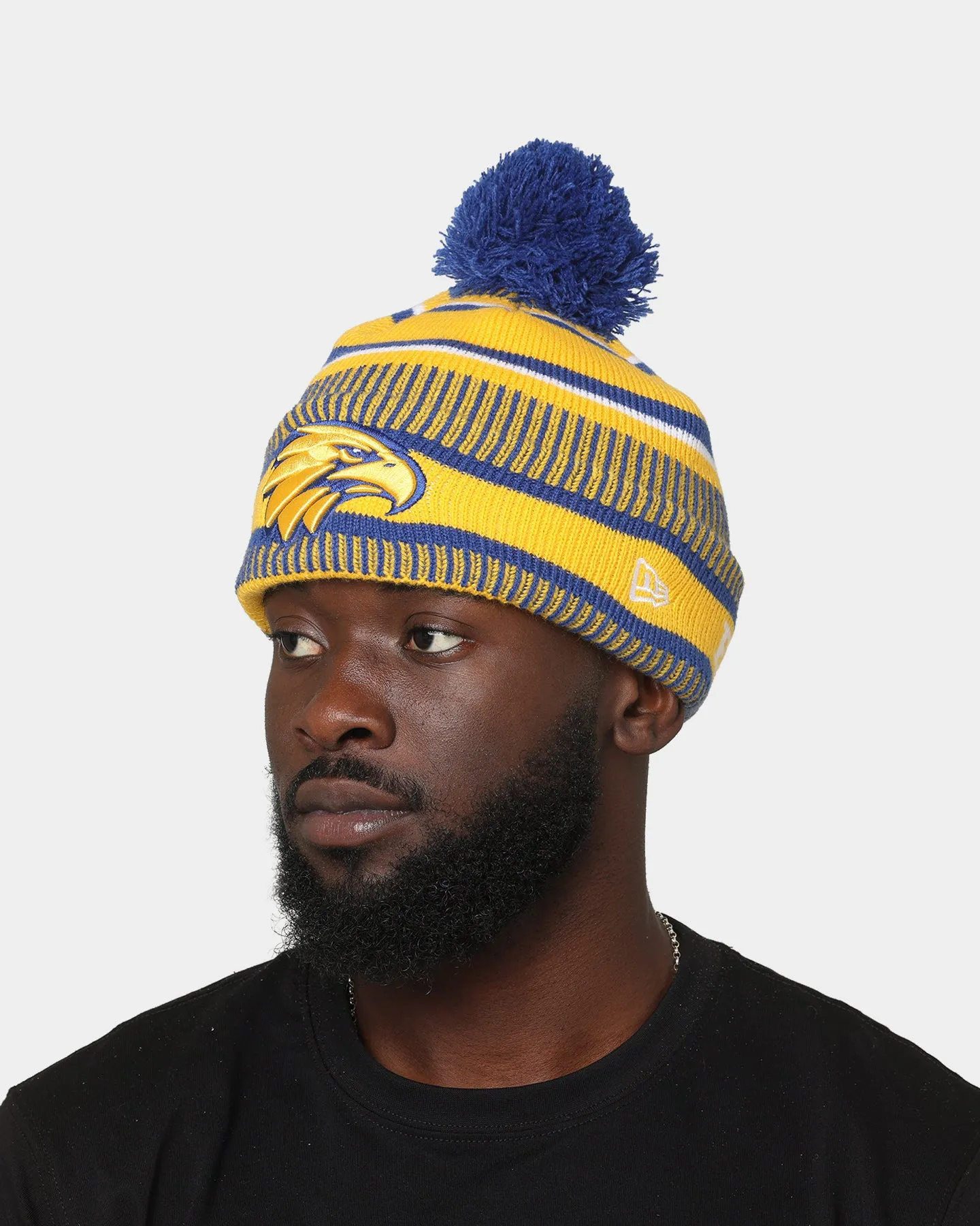 New Era West Coast Eagles AFL Opening Bounce 2022 Pom Wordmark Beanie Medium Blue